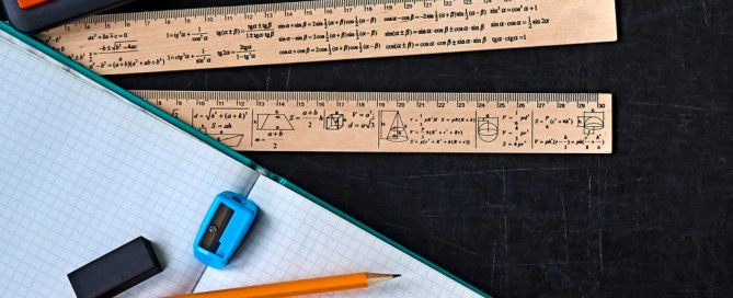 rulers pencils calculator and a workbook