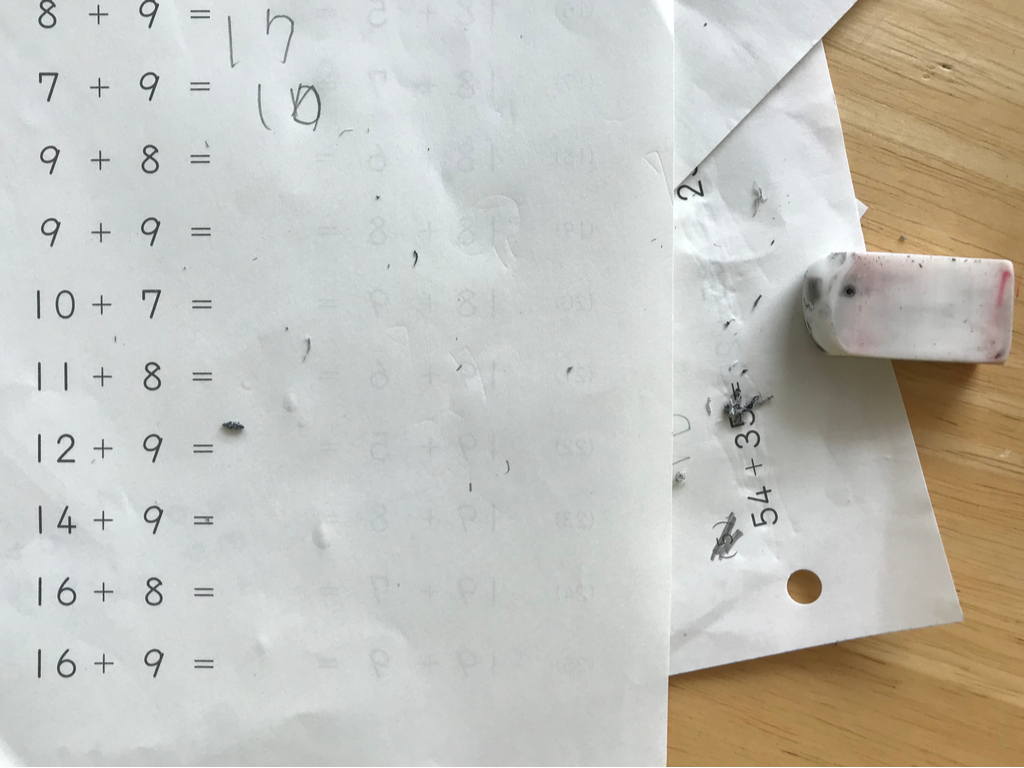 mathematics homework with errors and eraser