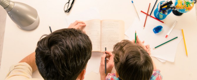 father helps son with homework
